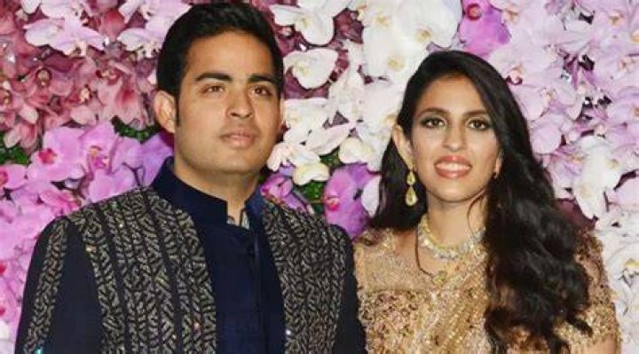 Akash Acharya with his wife