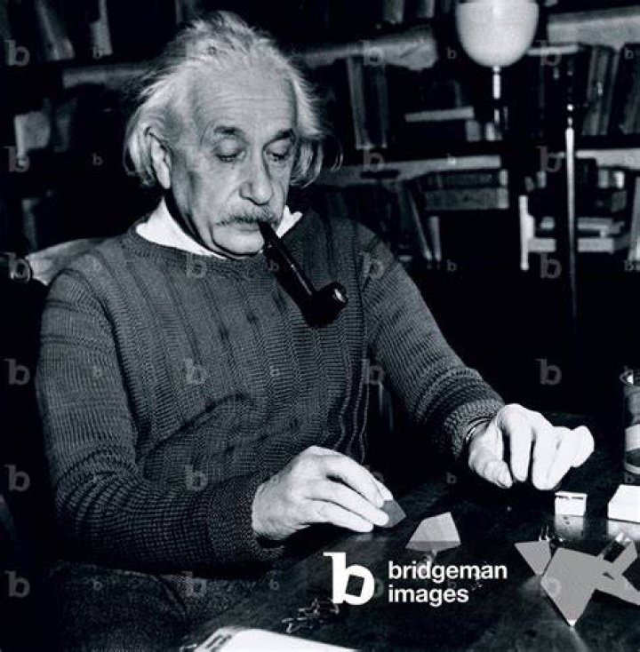 Albert Einstein Smoking A Pipe