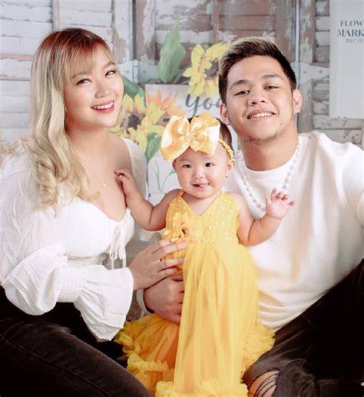 Carlyn Ocampo with her partner and daughter