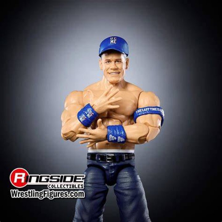 John Cena Smiles in Blue Shirt and Jeans