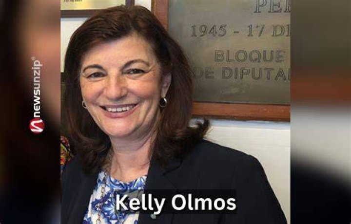 Kelly Olmos with his husband and sons