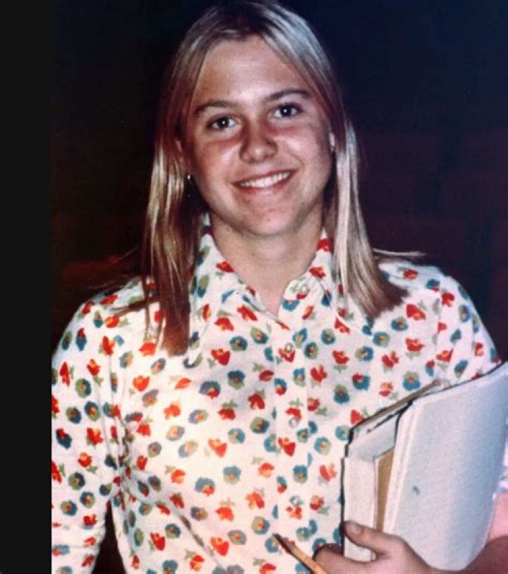 Martha Moxley Holding Books