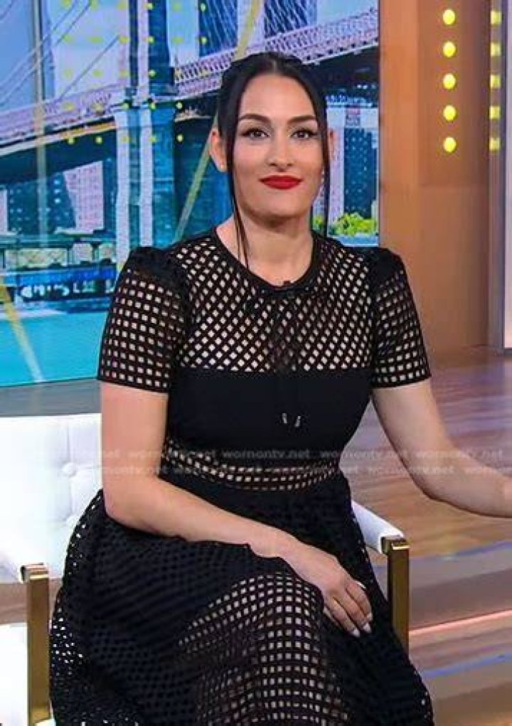 Nikki Bella Wears Black Lace Dress and Red Lipstick With Fiance Artem Chigvintsev in Black Turtleneck Split Image With John Cena in Blue Suit and Pink Tie